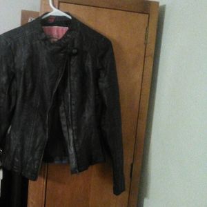 Poshmark
Faux Leather & Plaid Flannel Motorcycle J
